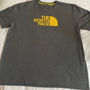 Gone fishing on vacation in a North Face t-shirt!